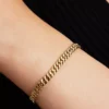 Armband mit kubanischer Kette, 14-karätig vergoldet Armband mit kubanischer Kette, 14-karätig vergoldet