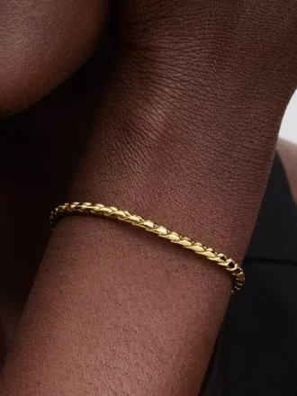 Armband mit rundem Verschluss und Flügelkette, 14-karätig vergoldet Armband mit rundem Verschluss und Flügelkette, 14-karätig vergoldet