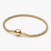 Armband mit rundem Verschluss und Flügelkette, 14-karätig vergoldet Armband mit rundem Verschluss und Flügelkette, 14-karätig vergoldet