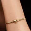 Armband mit Snake Chain und Herzverschluss, 14 Karat vergoldet Armband mit Snake Chain und Herzverschluss, 14 Karat vergoldet
