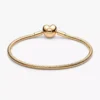 Armband mit Snake Chain und Herzverschluss, 14 Karat vergoldet Armband mit Snake Chain und Herzverschluss, 14 Karat vergoldet