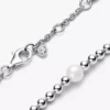 Armbänder aus behandelten Süßwasser-Zuchtperlen und Perlen in Sterlingsilber Armbänder aus behandelten Süßwasser-Zuchtperlen und Perlen in Sterlingsilber