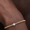 Armbänder mit behandelten Süßwasser-Zuchtperlen und Perlen – 14-karätige Vergoldung Armbänder mit behandelten Süßwasser-Zuchtperlen und Perlen – 14-karätige Vergoldung