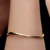 Bangle in organischer Form, 14-karätig vergoldet Bangle in organischer Form, 14-karätig vergoldet