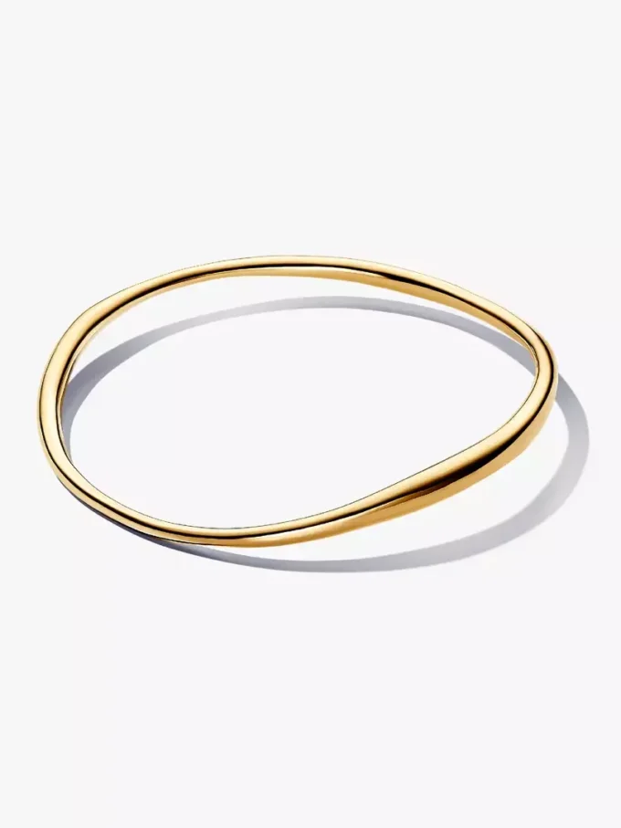 Bangle in organischer Form, 14-karätig vergoldet Bangle in organischer Form, 14-karätig vergoldet