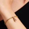 Beweglicher Nussknacker-Dangle Charm, 14-karätig vergoldet Beweglicher Nussknacker-Dangle Charm, 14-karätig vergoldet