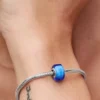 Blauer Mini-Murano Glass Charm aus Sterlingsilber Blauer Mini-Murano Glass Charm aus Sterlingsilber