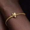 Charm „Abstrakte Wellen“, 14-karätige Vergoldung Charm „Abstrakte Wellen“, 14-karätige Vergoldung