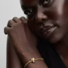 Charm „Abstrakte Wellen“, 14-karätige Vergoldung Charm „Abstrakte Wellen“, 14-karätige Vergoldung