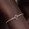 Charm „Home & Heart“ aus Sterlingsilber, 14-karätig vergoldet Charm „Home & Heart“ aus Sterlingsilber, 14-karätig vergoldet
