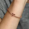 Charm mit offenem Herz und Perlenverzierung, 14 Karat rosévergoldet Charm mit offenem Herz und Perlenverzierung, 14 Karat rosévergoldet