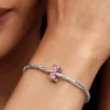 Charm „Rosa Schleife“ aus Sterlingsilber Charm „Rosa Schleife“ aus Sterlingsilber