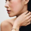 Clip Charm mit geknoteten Herzen, 14 Karat vergoldet Clip Charm mit geknoteten Herzen, 14 Karat vergoldet