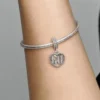 Dangle Charm „60th Celebration“ – Sterlingsilber Dangle Charm „60th Celebration“ – Sterlingsilber