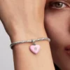 Dangle Charm aus Sterlingsilber mit rosa Keramik-Herz und Vorhängeschloss Dangle Charm aus Sterlingsilber mit rosa Keramik-Herz und Vorhängeschloss