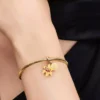 Disney Tangled Sundrop Flower Glow-in-the-Dark Charm, 14-karätig vergoldet Disney Tangled Sundrop Flower Glow-in-the-Dark Charm, 14-karätig vergoldet
