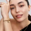 Armband mit Snake Chain und Herzverschluss, 14 Karat vergoldet Armband mit Snake Chain und Herzverschluss, 14 Karat vergoldet