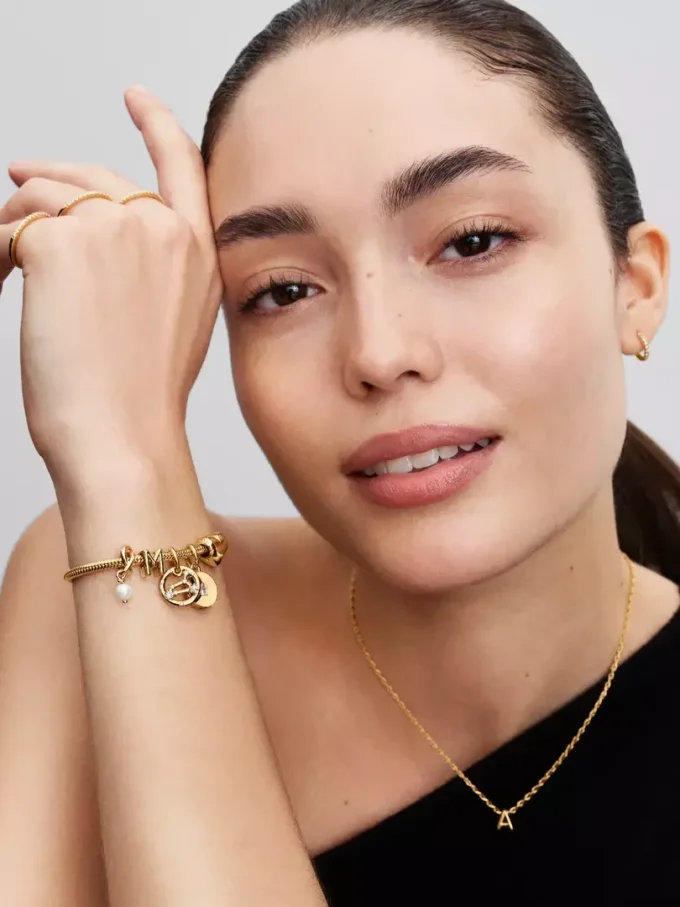 Armband mit Snake Chain und Herzverschluss, 14 Karat vergoldet Armband mit Snake Chain und Herzverschluss, 14 Karat vergoldet