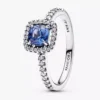 Funkelnder quadratischer blauer Halo-Ring aus Sterlingsilber Funkelnder quadratischer blauer Halo-Ring aus Sterlingsilber