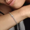Funkelndes Halo-Tennisarmband aus Sterlingsilber Funkelndes Halo-Tennisarmband aus Sterlingsilber