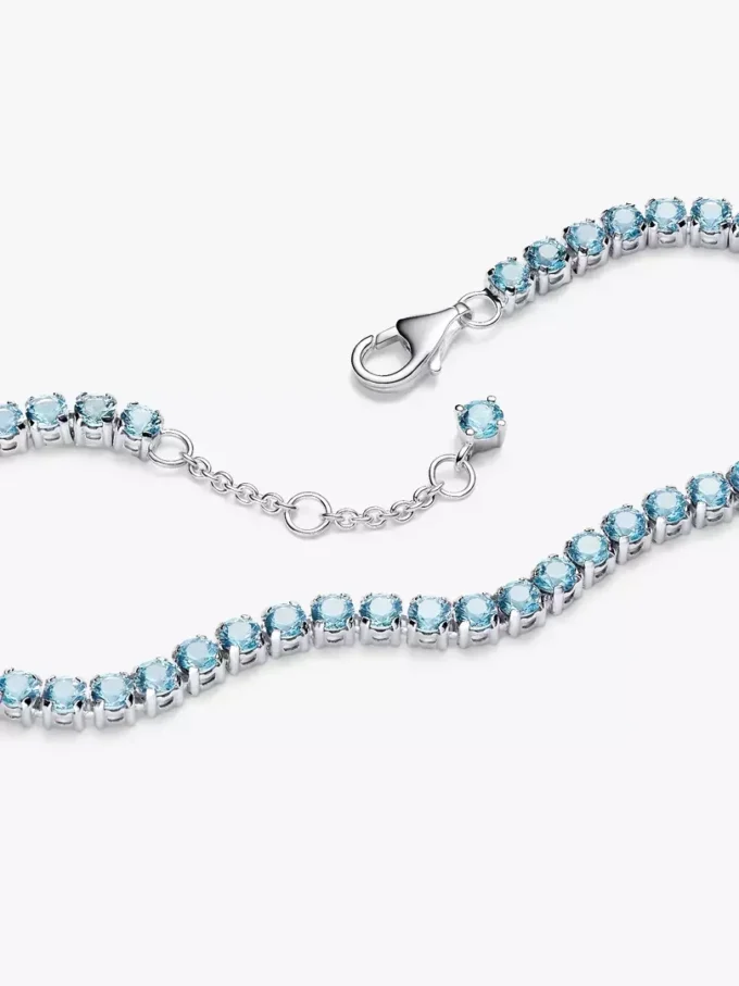 Funkelndes hellblaues Tennisarmband aus Sterlingsilber