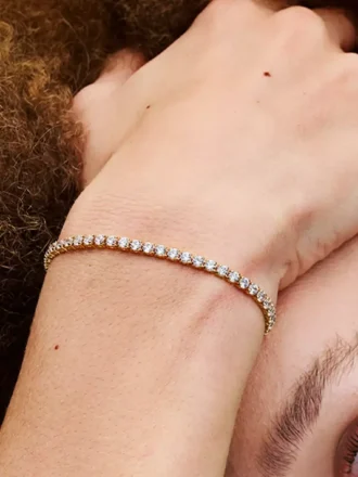 Funkelndes Tennisarmband, 14-karätig vergoldet