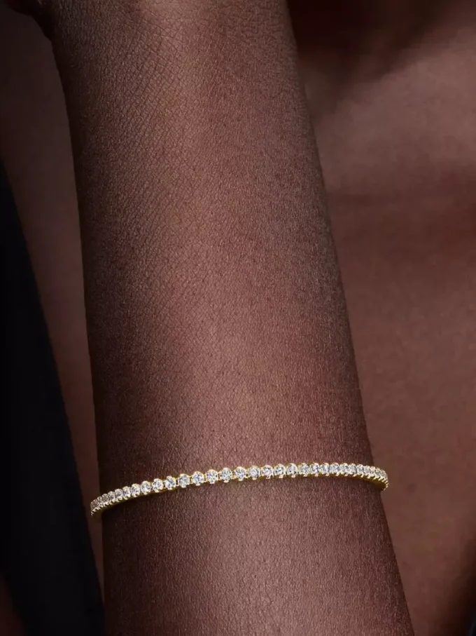 Funkelndes Tennisarmband, 14-karätig vergoldet