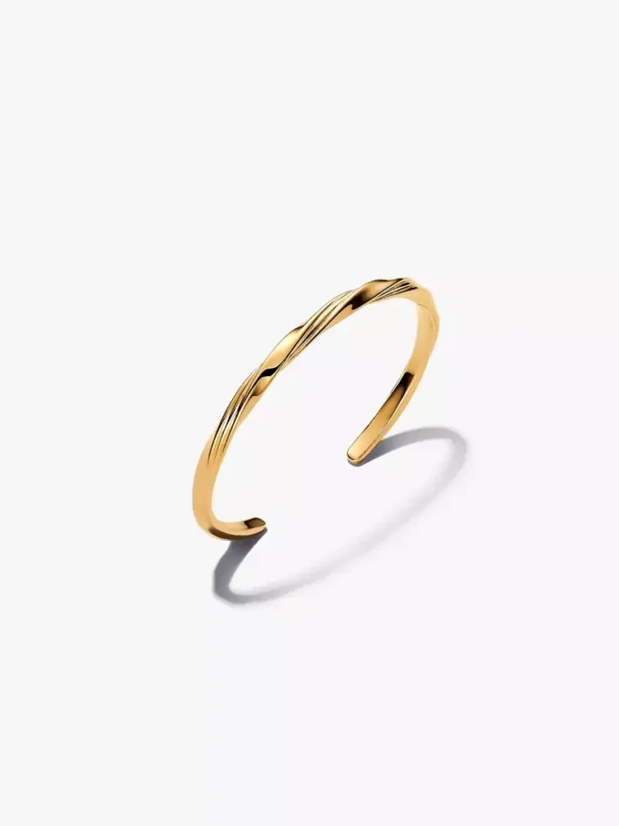 Gedrehter offener Bangle, 14 Karat vergoldet Gedrehter offener Bangle, 14 Karat vergoldet