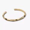 Gedrehter offener Bangle, 14 Karat vergoldet Gedrehter offener Bangle, 14 Karat vergoldet