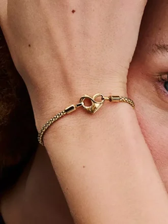 Kettenarmband mit Nieten, 14 Karat vergoldet Kettenarmband mit Nieten, 14 Karat vergoldet