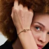 Kettenarmband mit Nieten, 14 Karat vergoldet Kettenarmband mit Nieten, 14 Karat vergoldet