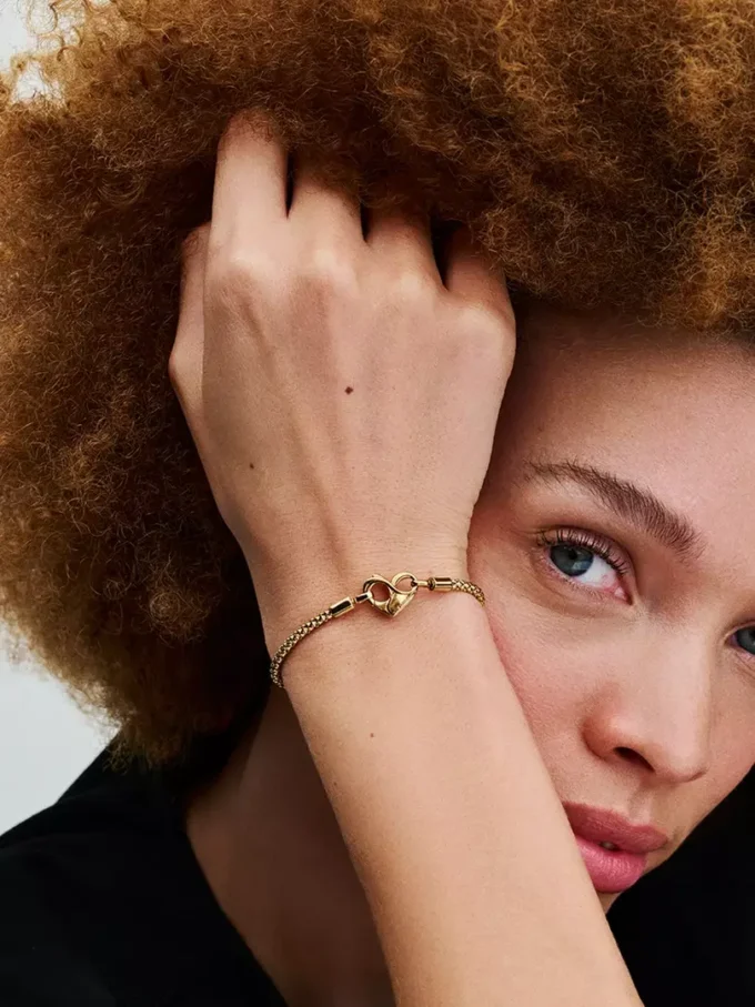Kettenarmband mit Nieten, 14 Karat vergoldet Kettenarmband mit Nieten, 14 Karat vergoldet