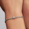 Mini-Charm „Puzzleteil“ aus Sterlingsilber Mini-Charm „Puzzleteil“ aus Sterlingsilber