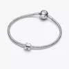 Mini-Charm „Puzzleteil“ aus Sterlingsilber Mini-Charm „Puzzleteil“ aus Sterlingsilber