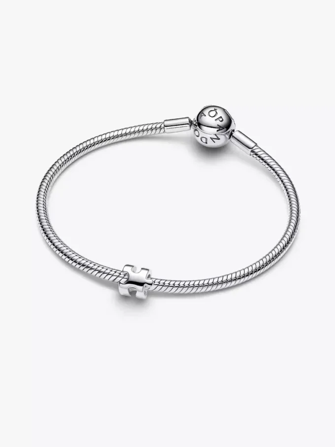 Mini-Charm „Puzzleteil“ aus Sterlingsilber Mini-Charm „Puzzleteil“ aus Sterlingsilber