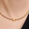 Mini-Charm „Strukturiertes Kleeblatt“ mit 14-karätiger Vergoldung Mini-Charm „Strukturiertes Kleeblatt“ mit 14-karätiger Vergoldung