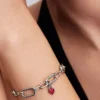 Mini-Dangle Charm „Rotes Chakra-Herz“ aus Sterlingsilber Mini-Dangle Charm „Rotes Chakra-Herz“ aus Sterlingsilber