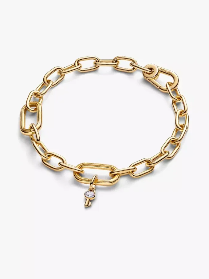 Mini-Dangle Charm „Schlüssel“ mit 14-karätiger Vergoldung Mini-Dangle Charm „Schlüssel“ mit 14-karätiger Vergoldung