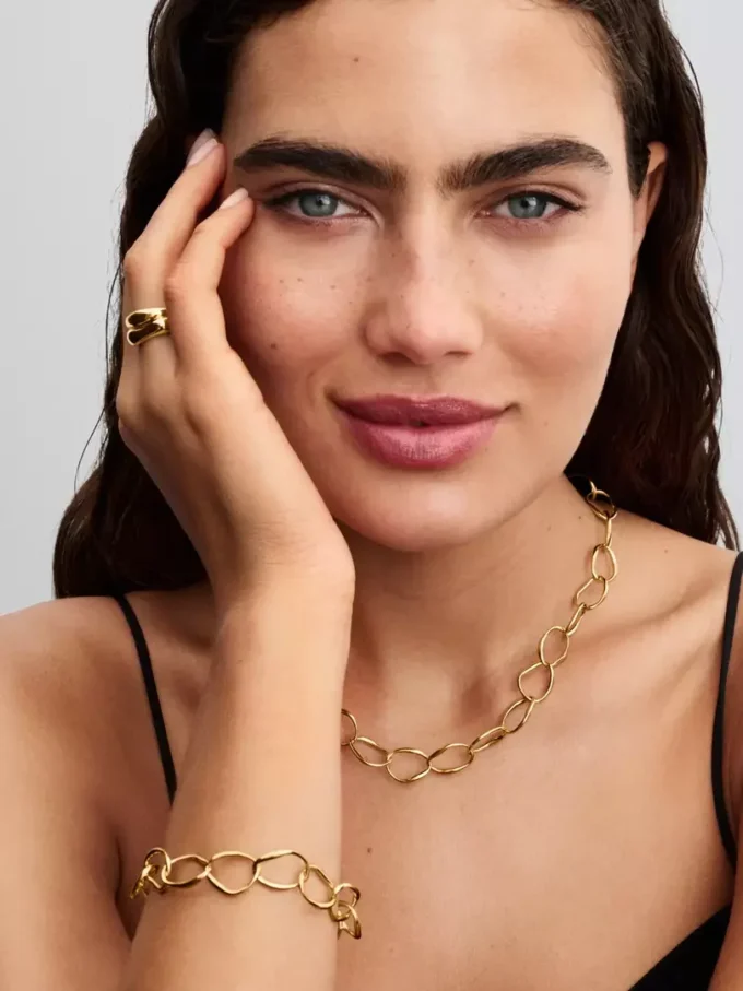 Organisch geformtes Gliederarmband, 14 Karat vergoldet Organisch geformtes Gliederarmband, 14 Karat vergoldet