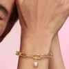 Pandora ME Dangle Charm „Sonne“ mit behandelter Süßwasserzuchtperle, 14-karätig vergoldet Pandora ME Dangle Charm „Sonne“ mit behandelter Süßwasserzuchtperle, 14-karätig vergoldet