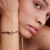 Pandora Moments Armband mit Herzverschluss und Snake Chain, 14 Karat Roségold-Beschichtung Pandora Moments Armband mit Herzverschluss und Snake Chain, 14 Karat Roségold-Beschichtung