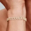Pavé-Armband mit kubanischer Kette, 14 Karat vergoldet Pavé-Armband mit kubanischer Kette, 14 Karat vergoldet