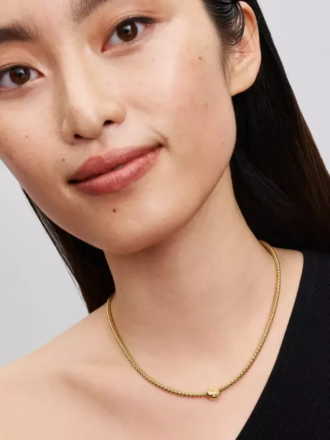 Strukturierter Yin-und-Yang-Mini-Charm, 14-karätig vergoldet