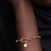 Weißer Glücksklee-Dangle Charm, 14-karätig vergoldet Weißer Glücksklee-Dangle Charm, 14-karätig vergoldet