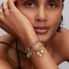 Weißer Glücksklee-Dangle Charm, 14-karätig vergoldet Weißer Glücksklee-Dangle Charm, 14-karätig vergoldet