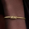 Wendbarer Mom-Charm, 14-karätig vergoldet Wendbarer Mom-Charm, 14-karätig vergoldet