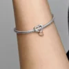 Zweifarbiger, durchbrochener Unendlichkeits-Herz-Charm aus Sterlingsilber, 14 Karat Roségold-Beschichtung Zweifarbiger, durchbrochener Unendlichkeits-Herz-Charm aus Sterlingsilber, 14 Karat Roségold-Beschichtung