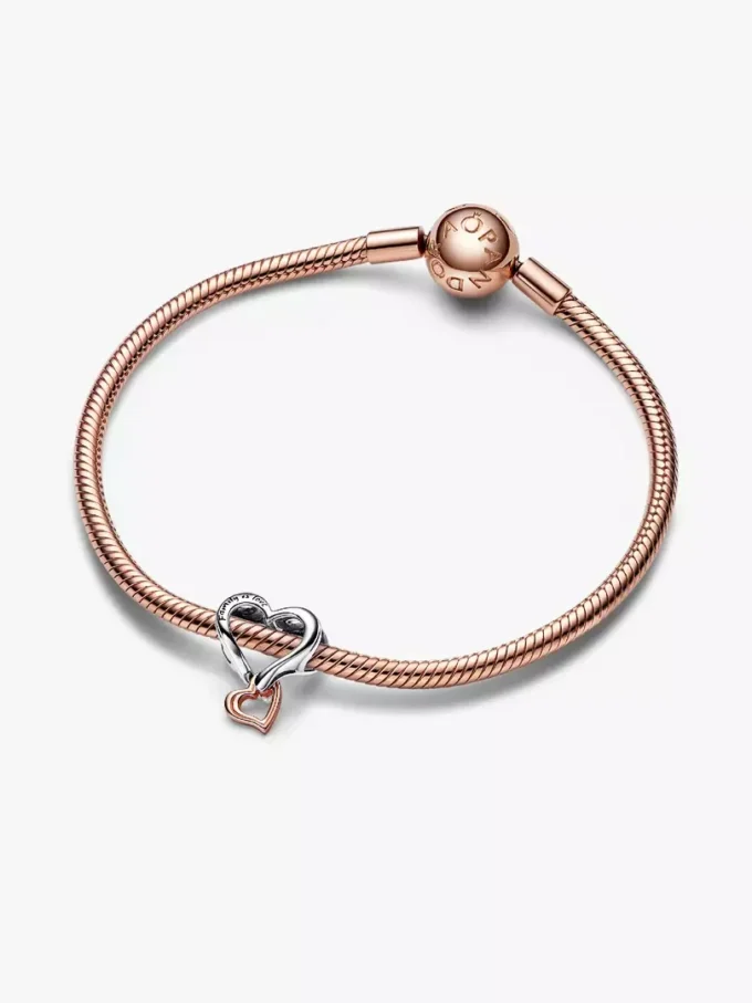 Zweifarbiger, durchbrochener Unendlichkeits-Herz-Charm aus Sterlingsilber, 14 Karat Roségold-Beschichtung Zweifarbiger, durchbrochener Unendlichkeits-Herz-Charm aus Sterlingsilber, 14 Karat Roségold-Beschichtung