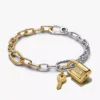 Zweifarbiges Armband und Charm-Set „Schloss und Schlüssel“ (2er-Set) Zweifarbiges Armband und Charm-Set „Schloss und Schlüssel“ (2er-Set)